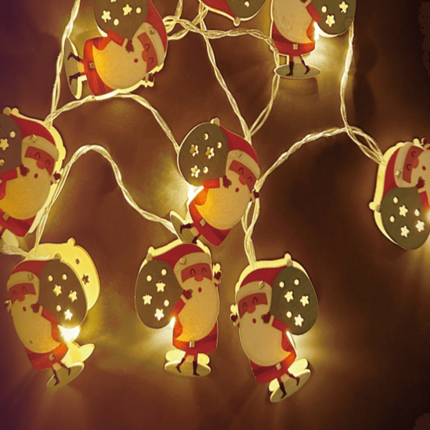 Aigostar - Guirlande LED 10 LED, alimentée par 3 piles AA, 1,5 m, blanc chaud, motif Père Noël