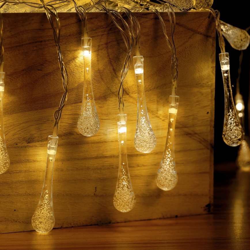 Aigostar - Guirlande de Noël LED d'extérieur 25xLED/8 fonctions 3xAA 2,5 m IP44 blanc chaud gouttes