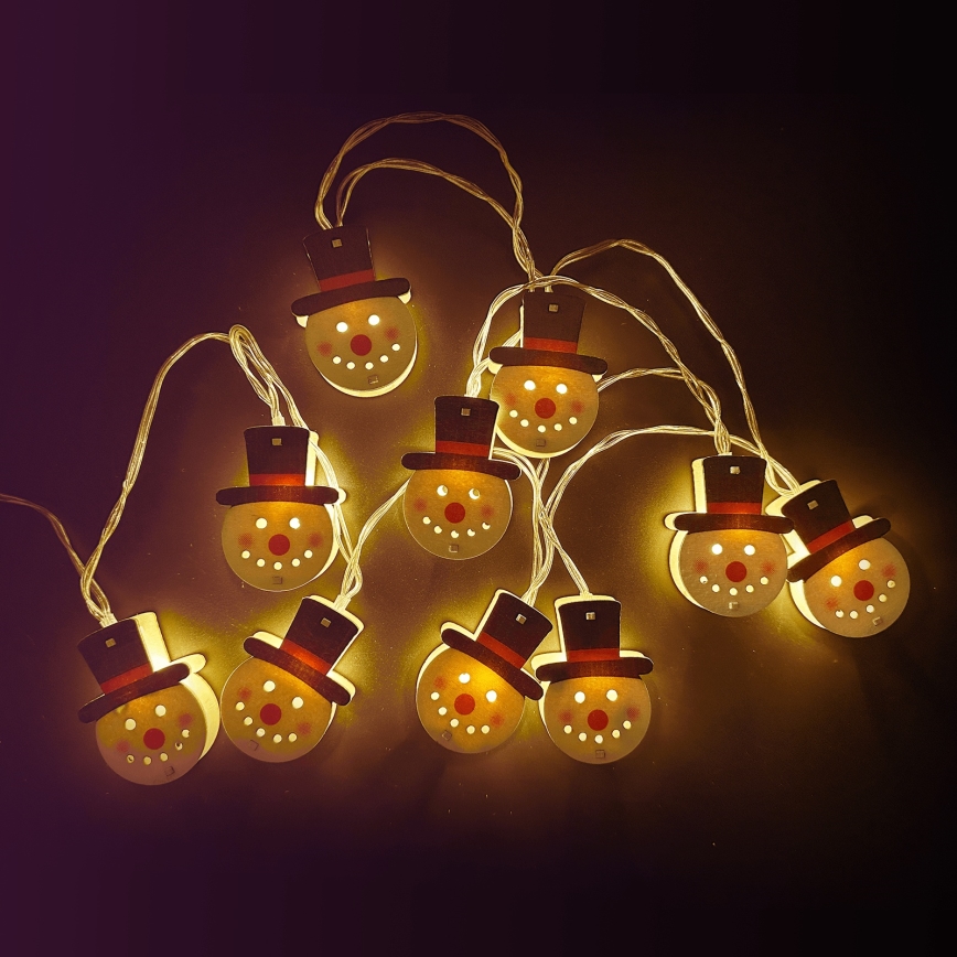 Aigostar - Guirlande lumineuse LED de Noël 10 LED/3xAA 1,5 m blanc chaud bonhomme de neige