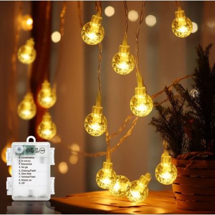 Aigostar - LED Kerst lichtsnoer voor buiten 100xLED/3xAA/8 Functies 10,3 m IP44 warm wit