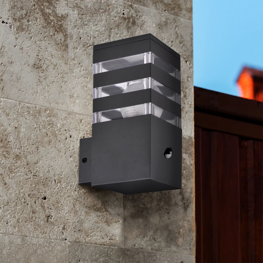 Applique murale extérieure avec détecteur TEKSAS 1xE27/12W/230V IP44 anthracite