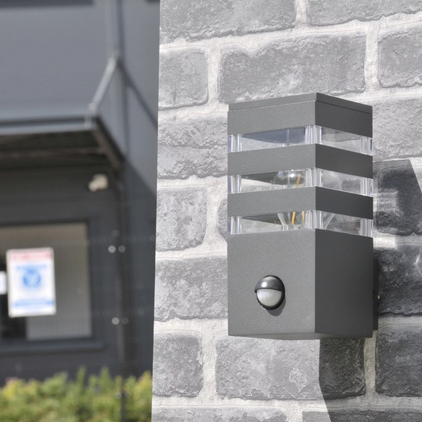 Applique murale extérieure avec détecteur TEKSAS 1xE27/12W/230V IP44 anthracite