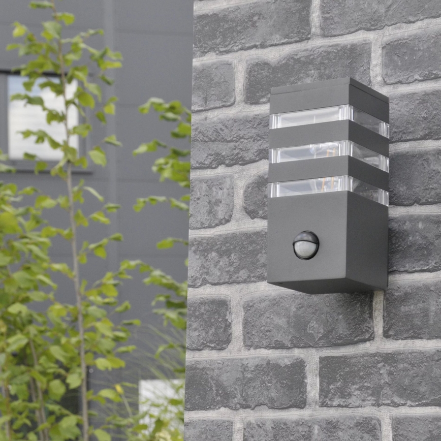 Applique murale extérieure avec détecteur TEKSAS 1xE27/12W/230V IP44 anthracite