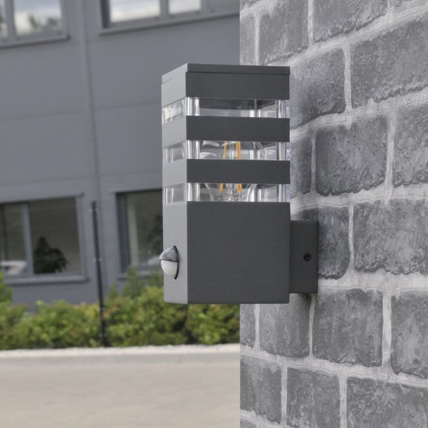 Applique murale extérieure avec détecteur TEKSAS 1xE27/12W/230V IP44 anthracite