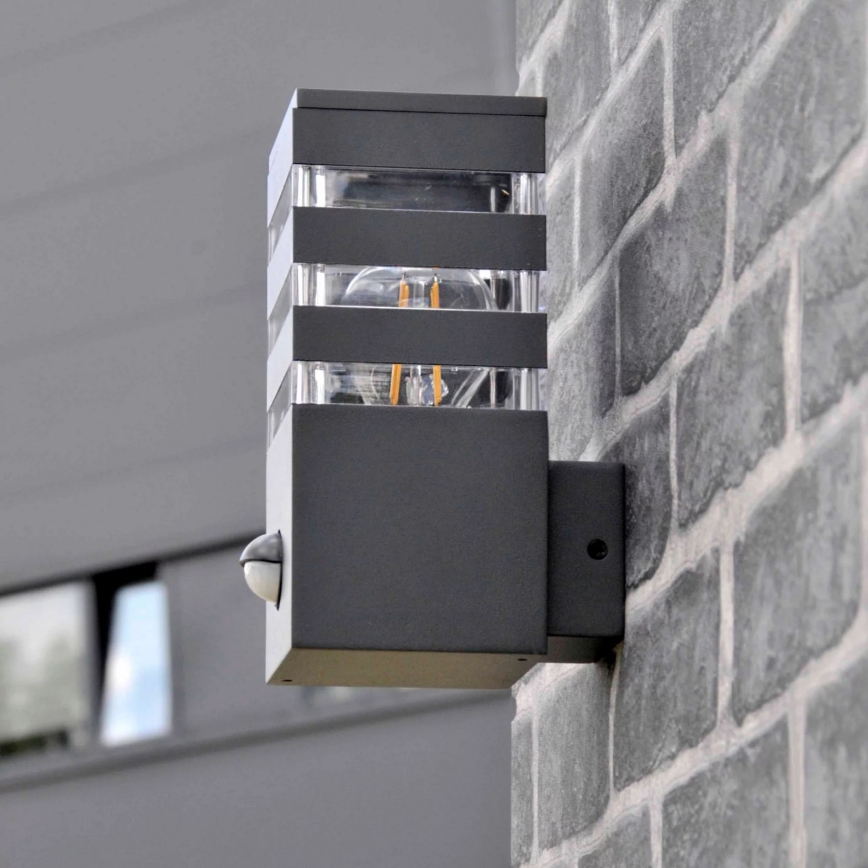 Applique murale extérieure avec détecteur TEKSAS 1xE27/12W/230V IP44 anthracite