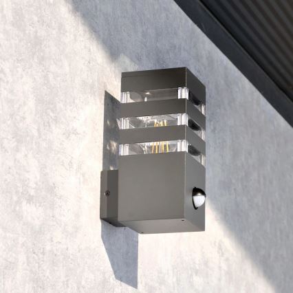 Applique murale extérieure avec détecteur TEKSAS 1xE27/12W/230V IP44 anthracite
