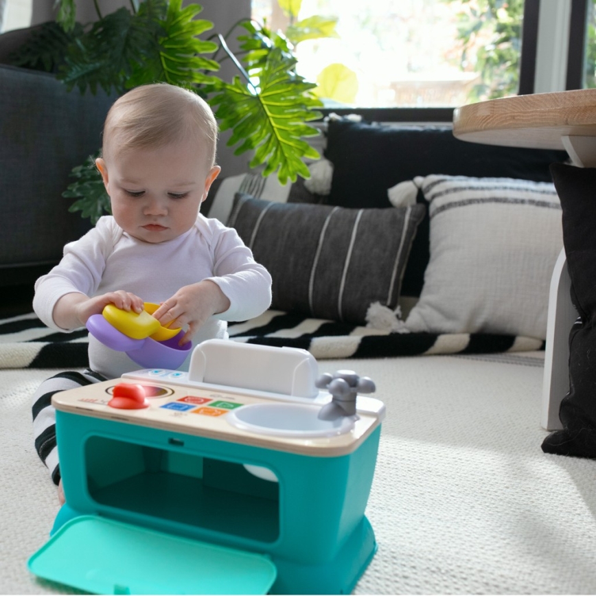 Baby Einstein - Cuisinette musicale MAGIC TOUCH, fonctionne avec 3 piles AA