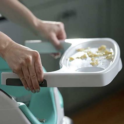 Baby Einstein - Eetkamerstoelkussen met 2 speeltjes 2in1 DINE&DISCOVER