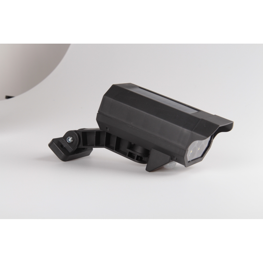 Caméra factice de surveillance LED avec capteur et panneau solaire LED/5W/5,5V 800 mAh IP65 + télécommande