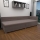Gestoffeerde divan met universeel hoofdeinde en opbergruimte AMSTERDAM 90x200 cm beige