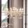 Ideal Lux - Kristallen hanglamp aan een ketting NEGRESCO 10xE14/28W/230V diameter 85 cm goud