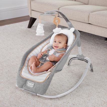 Ingenuity - Vibrerend wipstoeltje voor baby's met een melodie  BOUTIQUE 3xLR14