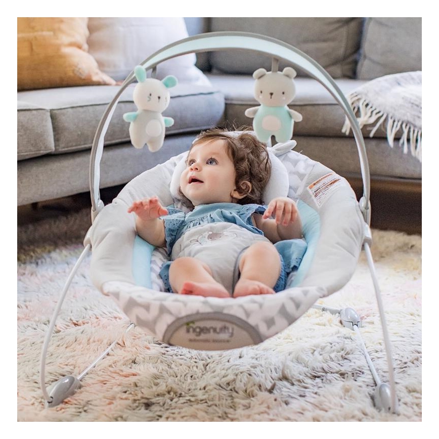 Ingenuity - Vibrerend wipstoeltje voor baby's met een melodie RAYLAN 3xLR14