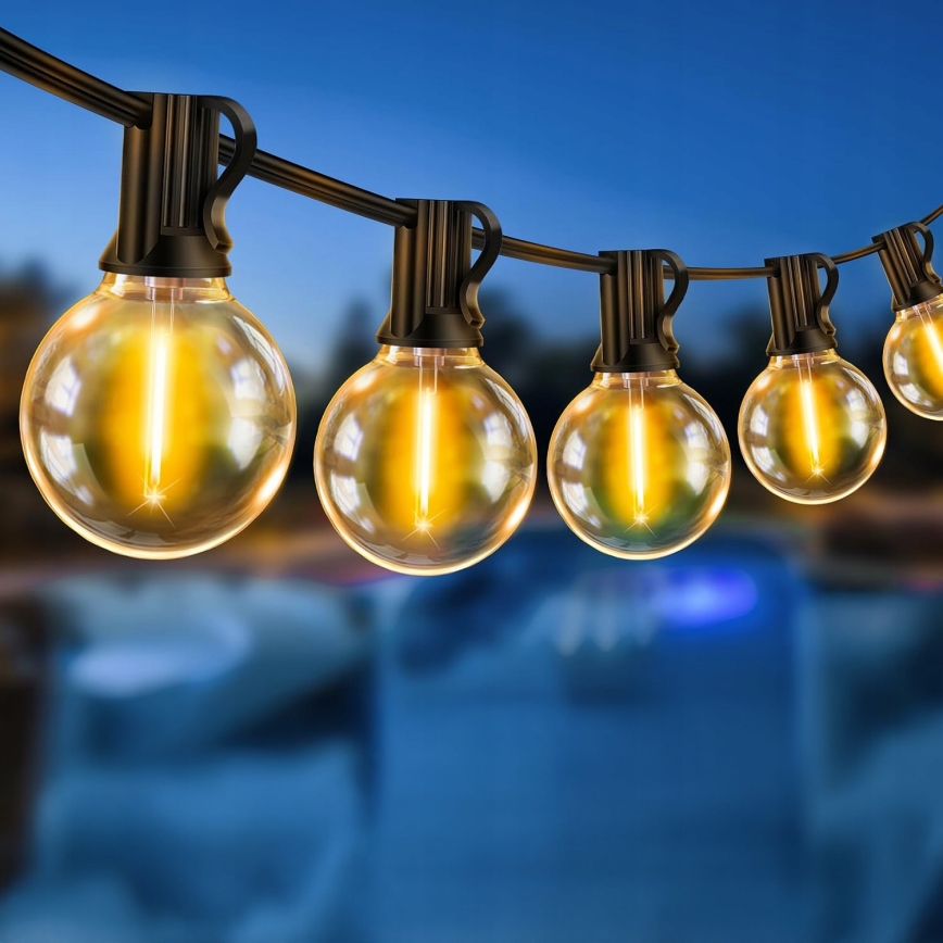LED dimbare decoratieve lichtslinger voor buiten 25xE12/1W/24/230V 17,5 m IP65 zwart + afstandsbediening