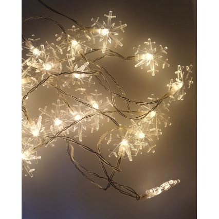 LED kerstlichtsnoer voor buiten 20xLED/2xAA 2,2 m IP44 warm wit sneeuwvlokken