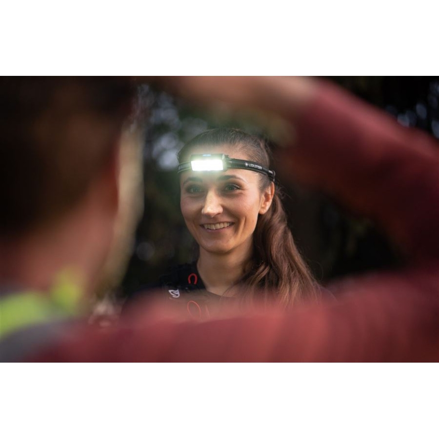 Ledlenser NEO9R - Lampe frontale rechargeable à LED à intensité réglable LED/5000 mAh IP54 1200 lm 120h noir/bleu