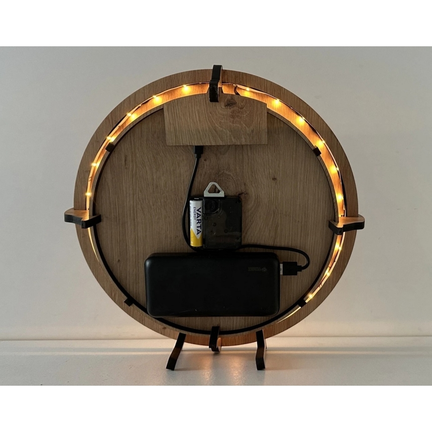 Li-Go 23712/DUB/BAT2 - Horloge LED à intensité réglable avec capteur de mouvement LED/10W/5V 20000 mAh + 1xAA Ø 32 cm chêne/Le Petit Prince