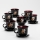 Lot 6x tasse en verre avec une soucoupe et 1x sucrier noir bouquet n° 3