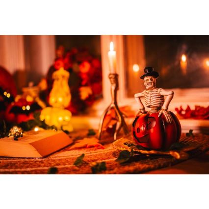 LED Decoratie HALLOWEEN LED/2xLR44/warm wit skelet in een pompoen hars