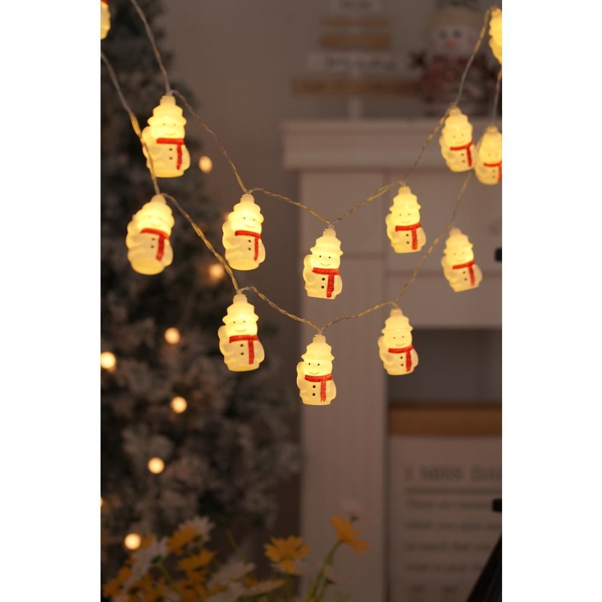 LED kerstlichtsnoer 20xLED/3xAA/warm wit 3,3m sneeuwpoppen