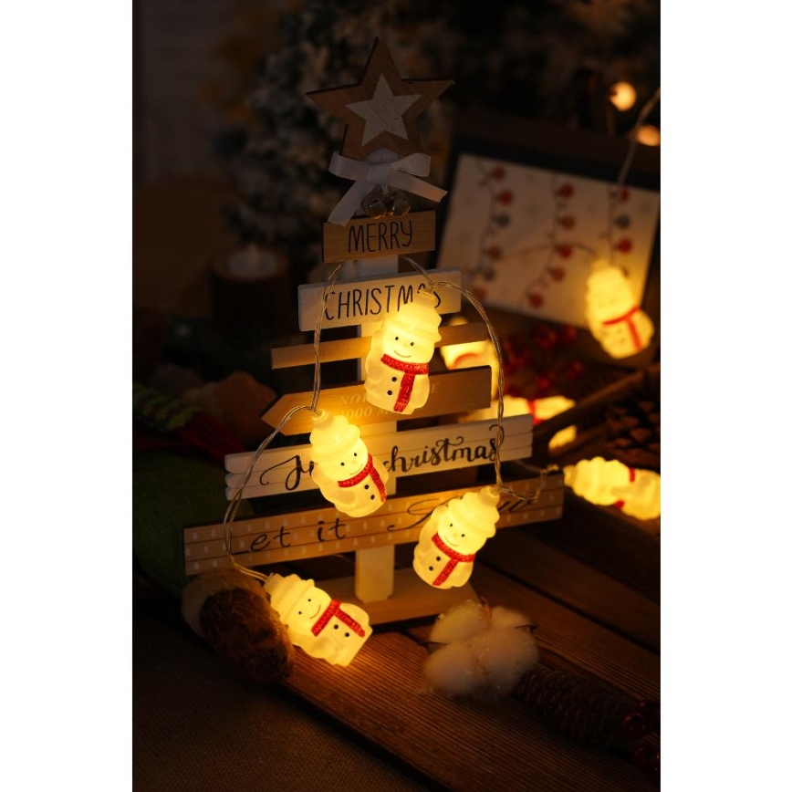 LED kerstlichtsnoer 20xLED/3xAA/warm wit 3,3m sneeuwpoppen