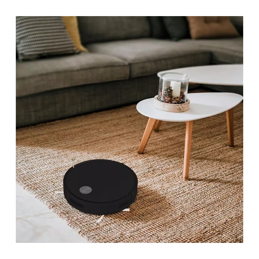 Robot aspirateur noir + télécommande
