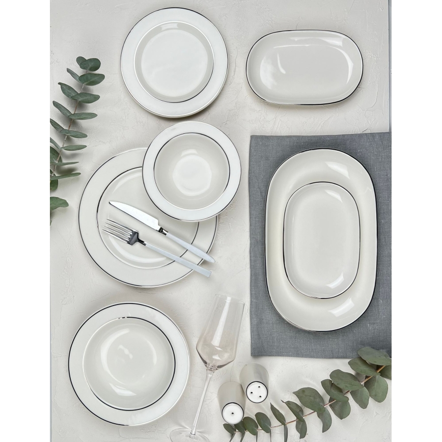 Service de table 53 pièces en porcelaine, finition crème et argentée
