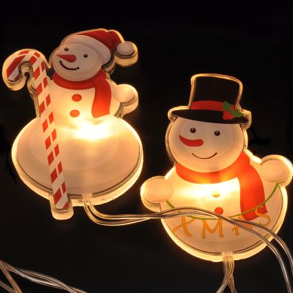 Guirlande de noël LED avec ventouses 6xLED/2xAA 1,2m blanc chaud bonhomme de neige