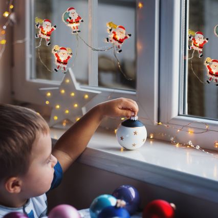 Guirlande de noël LED avec ventouses 6xLED/2xAA 1,2m blanc chaud Père Noël