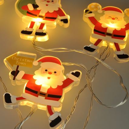 Guirlande LED de Noël avec ventouses 6xLED/2xAA 1,2m blanc chaud santa