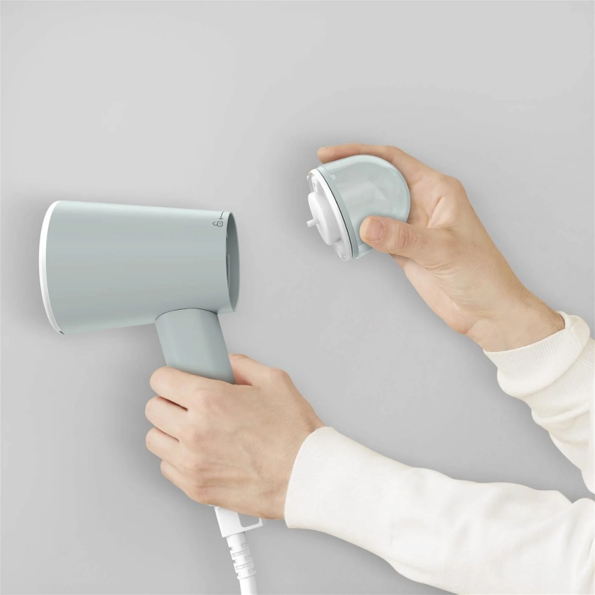 Tefal - Handbediende kledingstomer ORIGIN TRAVEL groen